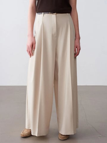 Wide leg Pantaloni di Dilvin in beige