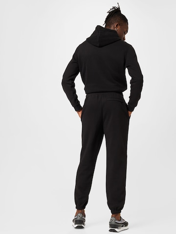 PUMA Tapered Broek in Zwart