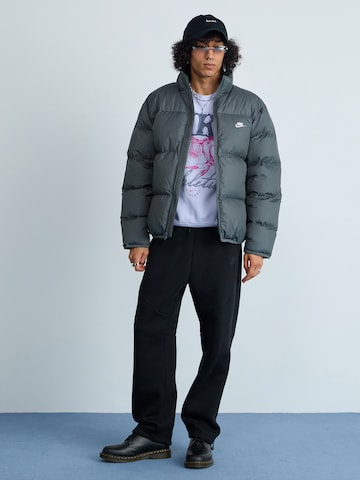 Regular Pantaloni 'Tech Flc' de la Nike Sportswear pe negru