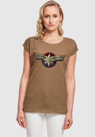 ABSOLUTE CULT Shirt 'Captain Marvel - Chest Emblem' in Bruin: voorkant