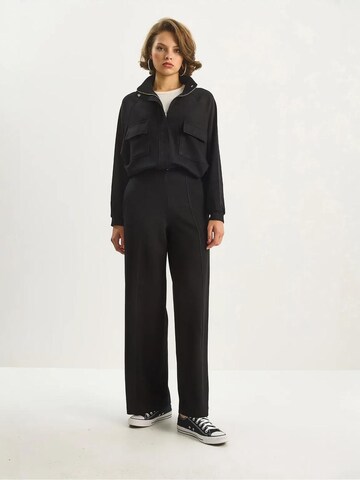 Abito da casa di Bianco Lucci in nero: frontale