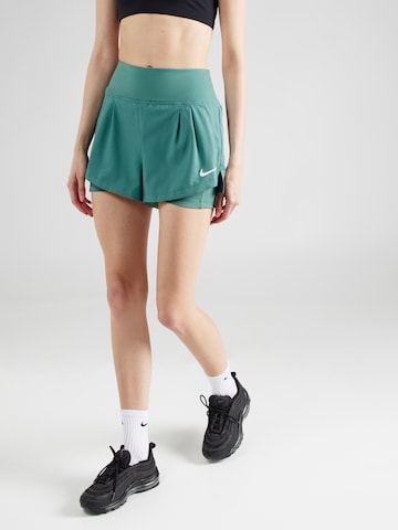 Regular Pantalon de sport NIKE en vert : devant