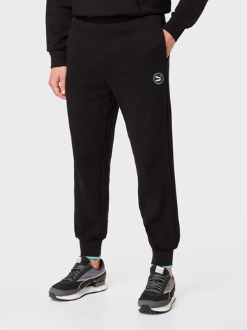 PUMA Tapered Trousers in Black: front