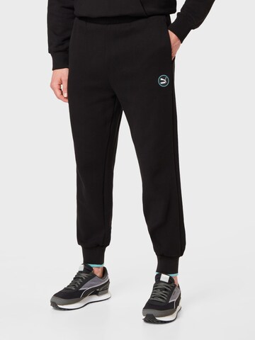 PUMA Tapered Pants in Black: front