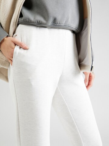 Tapered Pantaloni sportivi di Varley in beige