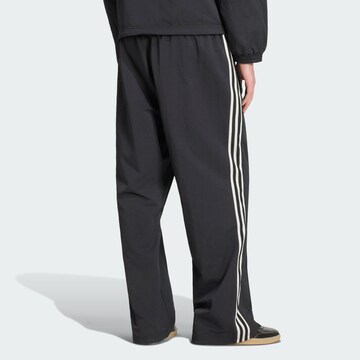 ADIDAS ORIGINALS - Loosefit Pantalón 'Britcore' en negro