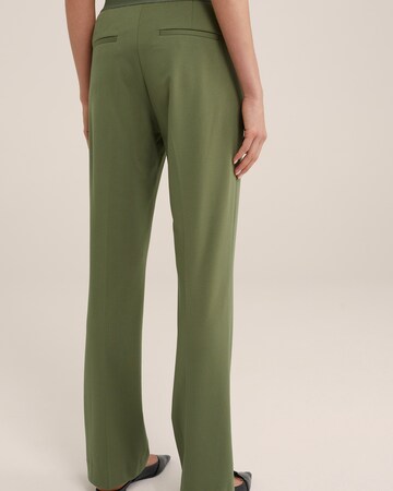 WE Fashion Bootcut Pantalon in Groen