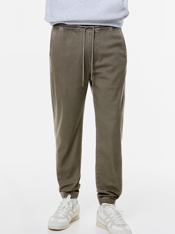 Pull&Bear Tapered Nadrág - zöld: elől