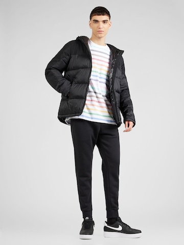 Nike Sportswear - Tapered Pantalón 'CLUB' en negro