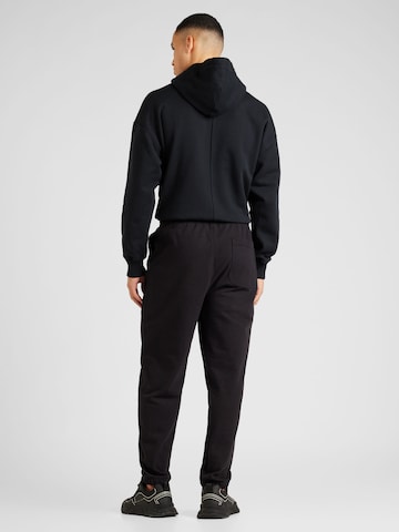 Tommy Jeans - Loosefit Calças em preto