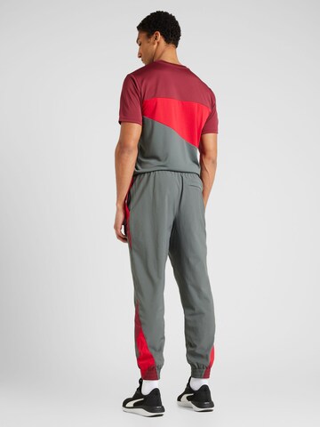 PUMA Tapered Sportbroek in Grijs