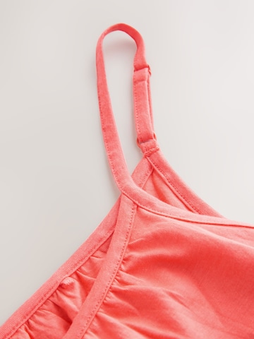 Top de la Next pe roz