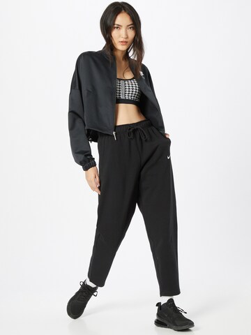 Loosefit Pantaloni de la Nike Sportswear pe negru