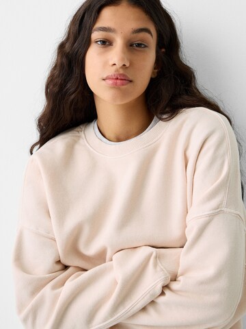 Sweat-shirt Bershka en rose