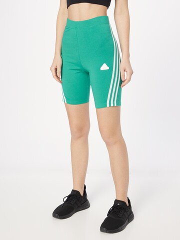 Skinny Pantaloni sportivi 'Future Icons 3-Stripes Bike' di ADIDAS SPORTSWEAR in verde: frontale