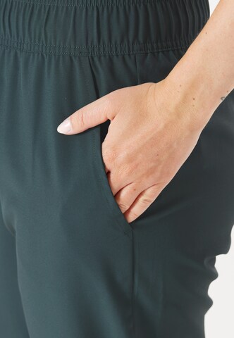 ENDURANCE Tapered Sports trousers 'Chaya' in Green