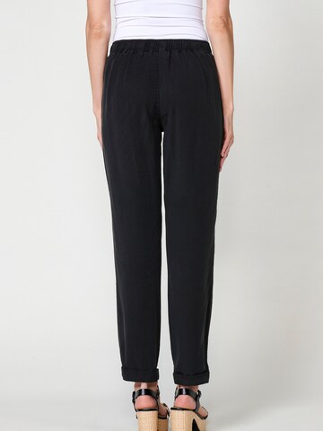 regular Pantaloni di KOROSHI in nero