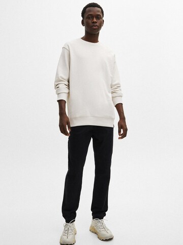 Pull&Bear Tapered Jeans in Schwarz: Vorderseite
