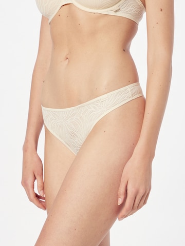 Tanga 'Sheer Marquisette' de la Calvin Klein Underwear pe bej: față