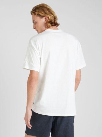 T-Shirt 'ESSENTIAL' Nike Sportswear en beige