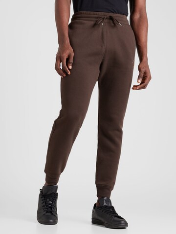 Effilé Pantalon HOLLISTER en marron : devant