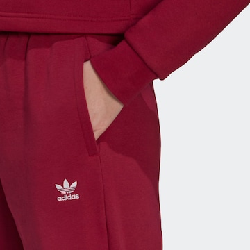 ADIDAS ORIGINALS Tapered Trousers 'Adicolor Essentials Fleece' in Red