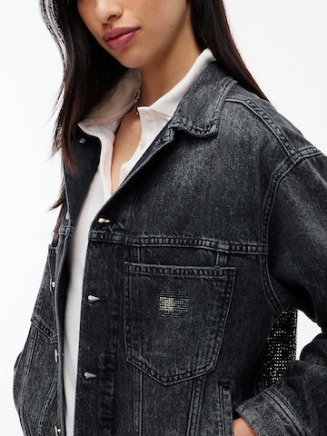 Tommy Jeans Φθινοπωρινό και ανοιξιάτικο μπουφάν σε μαύρο
