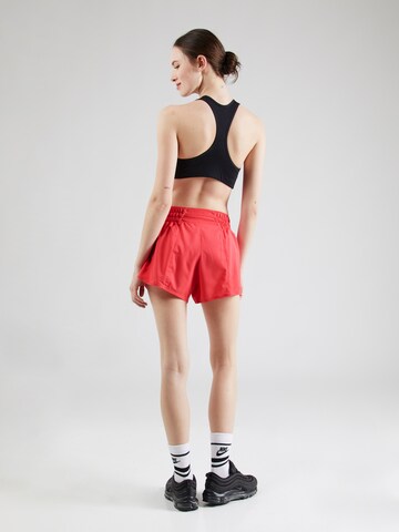 Regular Pantalon de sport 'ONE' NIKE en rose