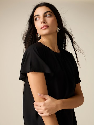 Camicia da donna di oltre in nero