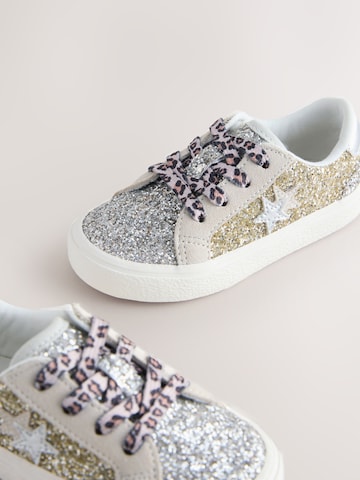 Baskets Next en or