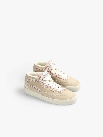 Sneaker alta di Scalpers in beige