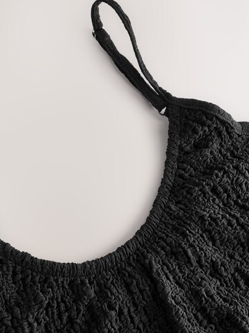 Robe Next en noir