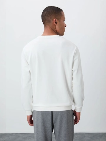 Sweat-shirt Tommy Life en blanc