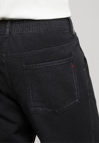 REPLAY Tapered Jeans in Black