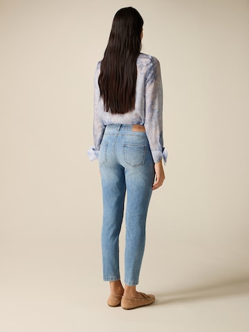 Skinny Jean oltre en bleu