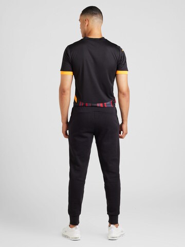 PUMA Tapered Sporthose 'ESS' in Schwarz
