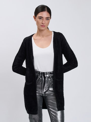 Influencer - Cárdigan en negro: frente