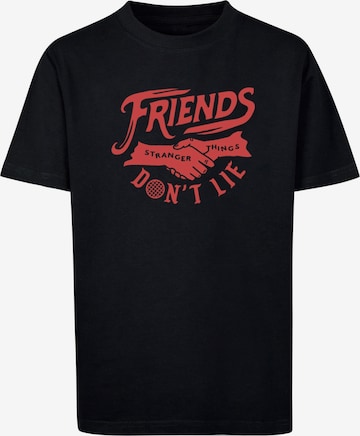 Maglietta 'Stranger Things - Friends Dont Lie' di ABSOLUTE CULT in nero: frontale