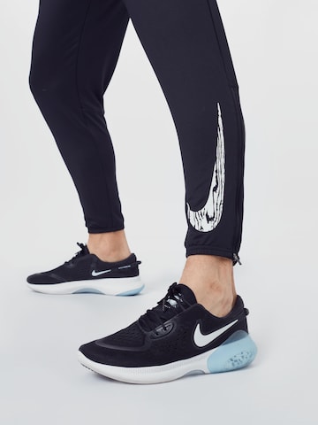 NIKE Tapered Sportbroek 'Wild Run' in Zwart