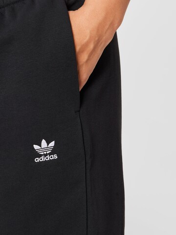 ADIDAS ORIGINALS Lużny krój Spodnie 'Adicolor Essentials ' w kolorze czarny