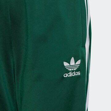 ADIDAS ORIGINALS Tapered Trousers 'Adicolor Sst' in Green