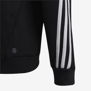 ADIDAS SPORTSWEAR Urheilullinen collegetakki 'Future Icons' värissä musta