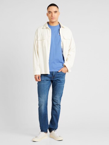 Tommy Jeans Regularny krój Koszulka w kolorze niebieski