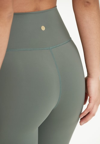 Athlecia Skinny Workout Pants 'Gaby' in Green