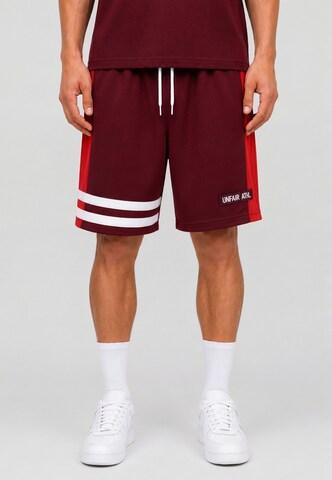 Unfair Athletics Regular Trousers 'Dmwu' in Red: front