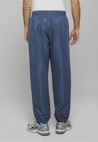 Sergio Tacchini Tapered Broek in Blauw