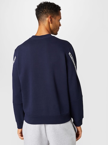 LACOSTE Sweatshirt i blå