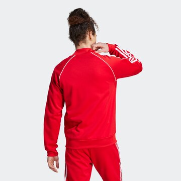 Veste de survêtement 'Adicolor Classics Sst' ADIDAS ORIGINALS en rouge