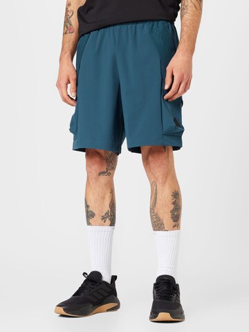 regular Pantaloni sportivi 'City Escape' di ADIDAS SPORTSWEAR in blu: frontale