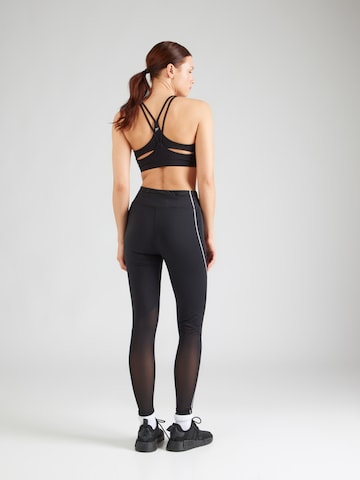 Reebok Skinny Sportsbukser i sort